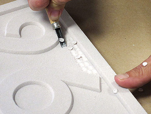 The first steps of carving your DIY address plaque